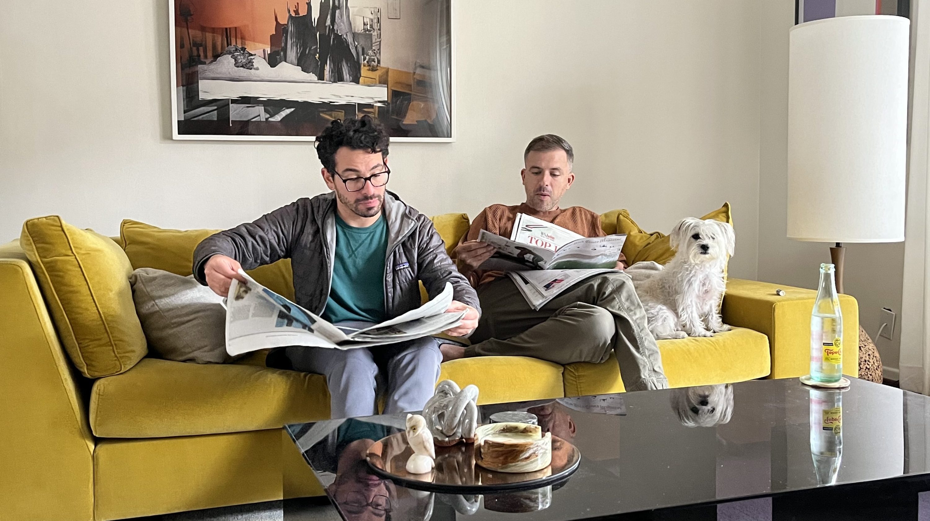 Artist Amir Nikravan (left) and the author (center) in their former home — with Jasper (right, still alive) on the couch he so loved to defile.
