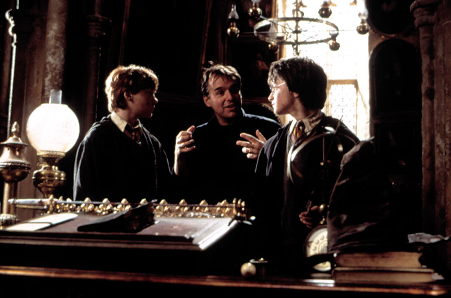 Rupert Grint, Chris Columbus and Daniel Radcliffe on set of 'Chamber of Secrets.'