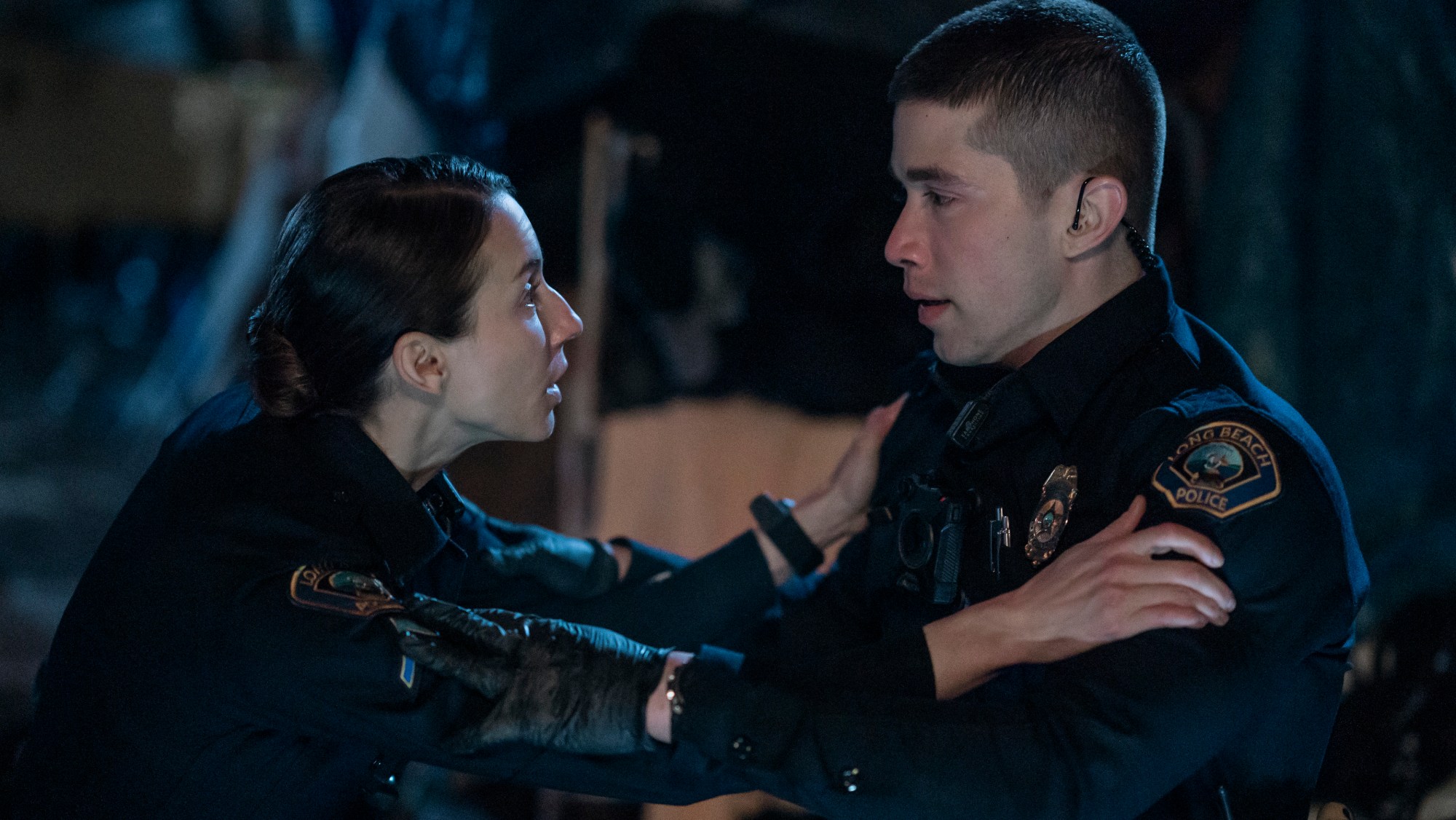 Troian Bellisario's Traci Harmon and Brandon Larracuente's Alex Diaz in 'On Call.'
